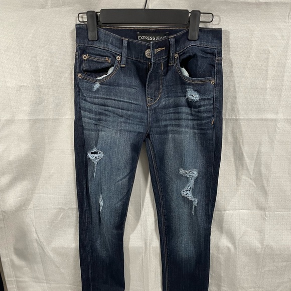Express jeans midrise jeggings size 0, distressed dark blue rips - Picture 2 of 5